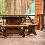 Столик на веранде дома 4 — загородный отдых в Тюмени