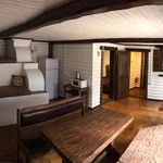 Гостиная с русской печью дома 5 — снять дом в Тюмени