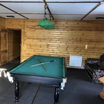 Бильярдный стол дома 7 — база отдыха Усадьба в Тюмени