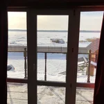 Вид на озеро зимой из дома 7 — коттедж на базе отдыха Усадьба